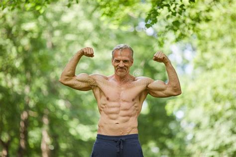 Senior Man Demonstrating Muscles Stock Photo Image Of Macho Torso
