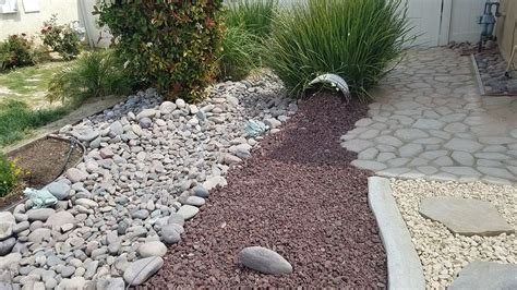 Lava Rock And A Dry River Bed Landscaping With Rocks Backyard