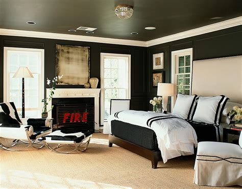 Furniture pieces are all in white, some of which have unique textures like the padded headboard and the tufted ottoman. 10 Beautiful Bedrooms That Will Take You Back to Black!