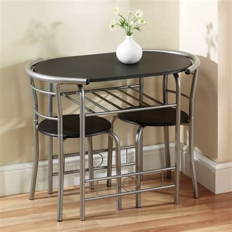 The small dining table for two can be set up pretty much anywhere and it is the perfect place to enjoy a refreshing cup of tea of coffee in the morning and to have a lovely acrylic chairs, foldable dining tables and pendant lights that melt into the backdrop make these tiny delights even more fabulous. 2 seater dining table | Space saving dining table, Compact ...