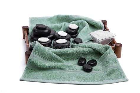 Isolated Massage Stones Set With Candles Salt And Towels Stock Image Image Of Basalt
