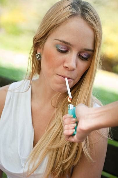 40 Girl Using Lighter To Light Cigarette Stock Photos Pictures