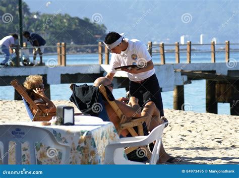 Waiter Serving Tourists On The Beach In Puerto Vallarta Mexico Editorial Image Image Of