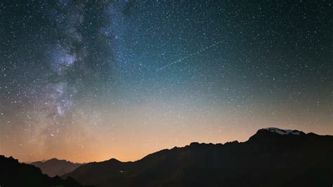 Star Trails Over The Mountains In Night Sky Image Free Stock Photo