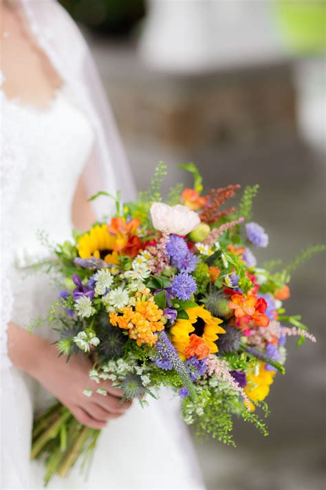 Colorful Sunflower Thistle And Wildflower Bouquet Wildflower Wedding Bouquet Sunflower