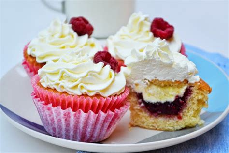 .ice cream filled cupcakes for a while now, and since summer is sneaking up on us, i thought this was as good time as any to share this pretty cupcake recipe make vanilla cupcakes, core out some cake, fill empty space with ice cream, top with whipped frosting and done! Vanilla Cupcakes with Clotted Cream and Raspberry Jam ...