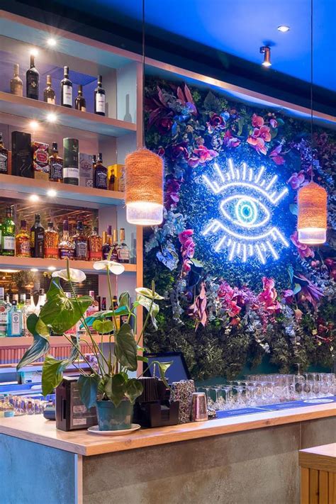 Beautiful Bar Design Neon And Planting Flowers And Foliage Electric