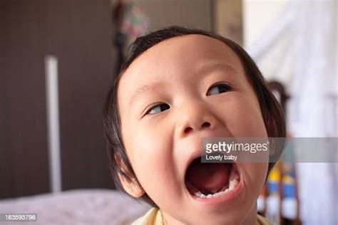Baby Making Funny Faces Photos And Premium High Res Pictures Getty Images