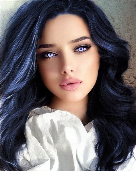 A Woman With Long Black Hair And Blue Eyes
