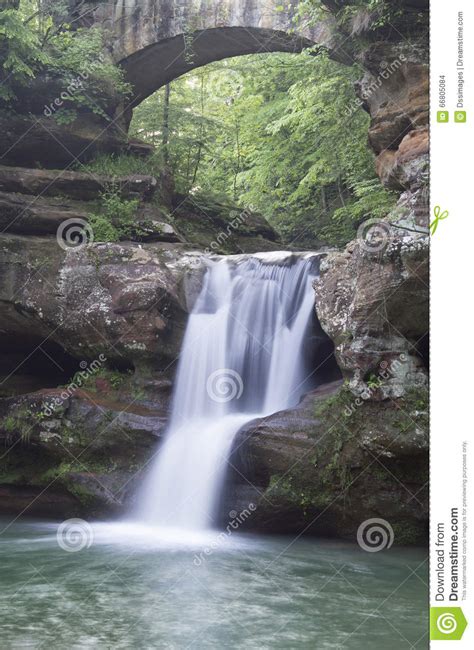 Waterfall Under A Stone Arch Stock Photo Image Of Pool Flow 66805084
