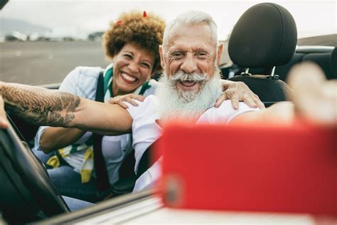 Premium Photo Trendy Senior Couple Having Fun In Convertible Car