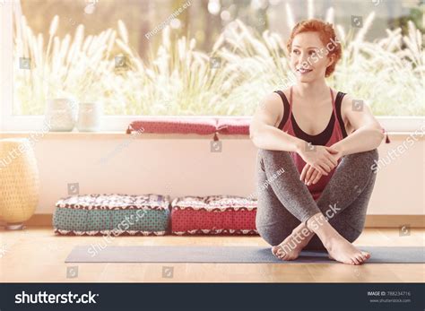Smiling Woman Sitting Crossed Legs Colorful Stock Photo 788234716