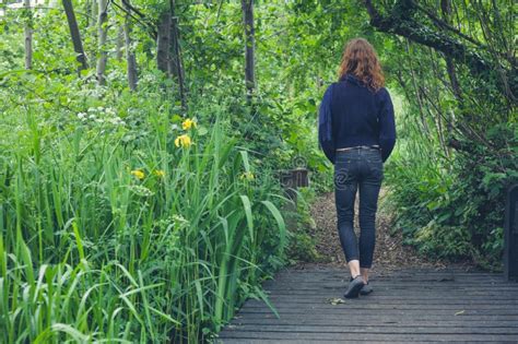 Woman Walking On Path In Forest Stock Photo Image 55264667