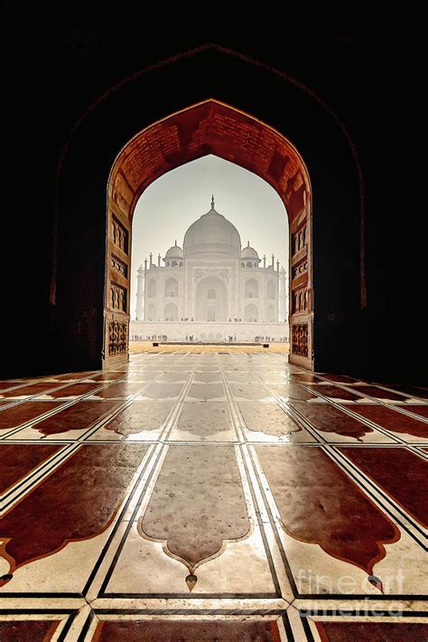 The White Marble Taj Mahal Building Seen From Inside The Red Stone