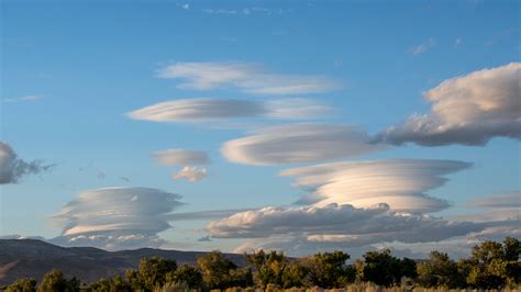 Lenticular Clouds Over Mountain Range Stock Photo Download Image Now