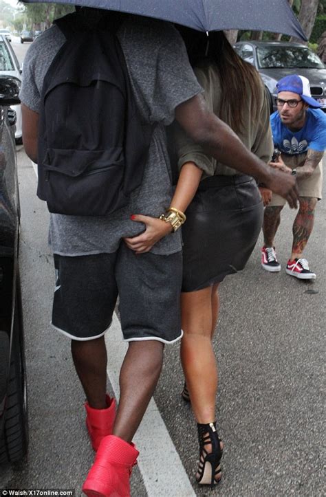 kim kardashian is caught intimately squeezing kanye west s backside daily mail online