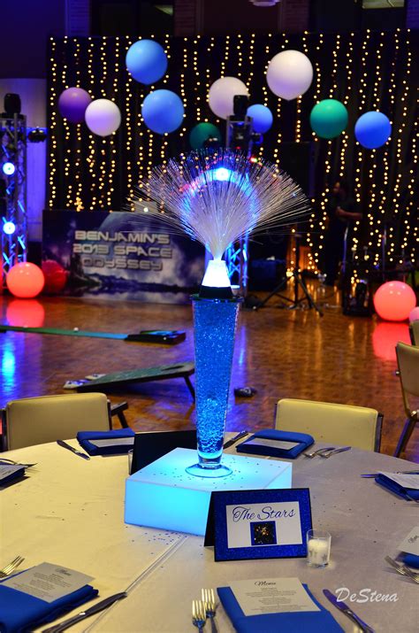 The plastic silverware is in a classic cream yellow color while the paper plates, napkins and cups are in vibrant blue, green, yellow color with football,basketball, soccer. Space theme Bar Mitzvah www.tieabowdallas.com Dallas ...
