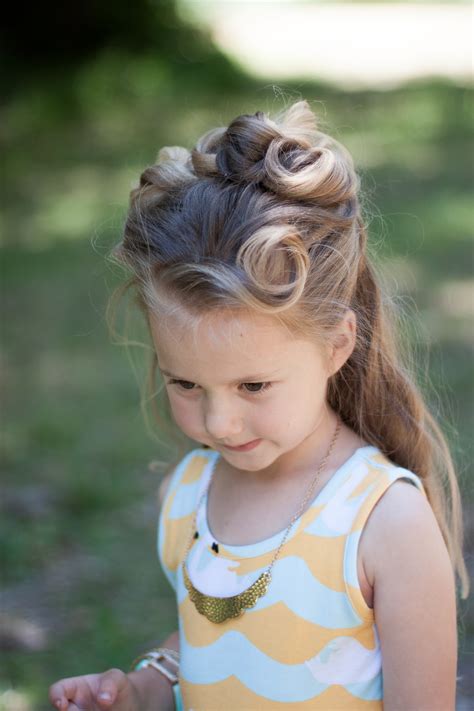 The length of her hair goes lower than her half. Half Up Hairstyles | Cute Girls Hairstyles