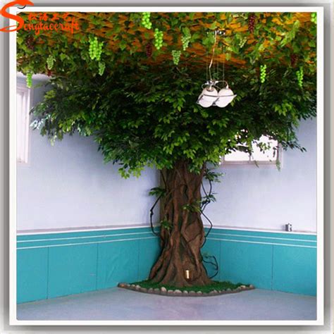 The most common fake trees decor material is plastic. artificial greenery fiberglass ficus microcarpa trees ...
