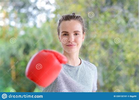 Portrait Of Young Fitness Sporty Woman In Sportswear With Red Boxing