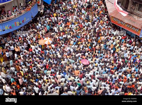 Crowded Road People Gathered To See Dahi Handi On Govinda Gokul Stock