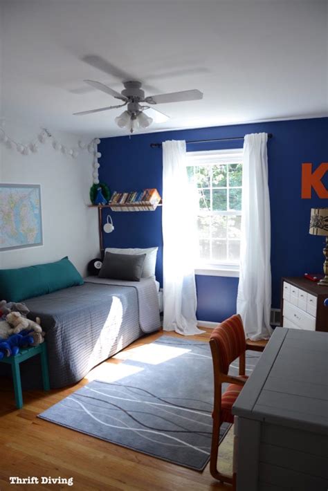 In this boy's bedroom designed by barry dixon, the various prints bring intrigue to the calming blue tones used throughout. BEFORE & AFTER: Tween Boys Bedroom Makeover Reveal!