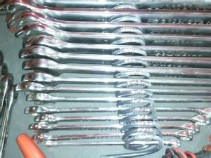 Tool box springs yellow post sites. Homemade Coil Spring Wrench Organizer - HomemadeTools.net