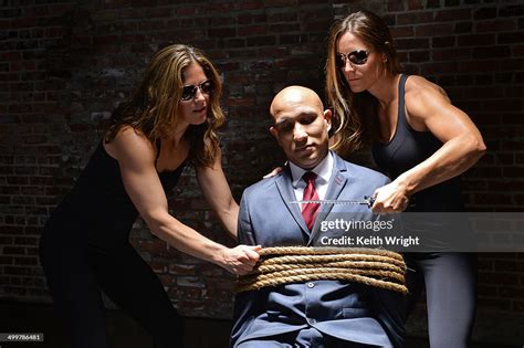 Man Tied Up By 2 Strong Women Photo Getty Images