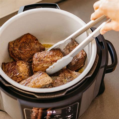 Slow cookers can be a pain in the behind to clean, because you're essentially binding food to it for eight or more hours in a single use. Ninja Foodi Pressure Cooker is Oven, Steamer, Air Fryer & More