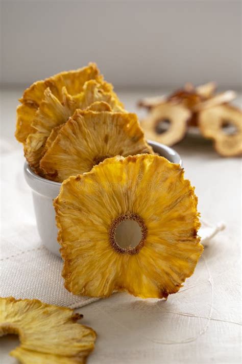 Dried Pineapple Slices In A Bowl Bright Background Healthy Snack Or