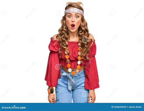 Young Blonde Girl Wearing Bohemian And Hippie Style Scared And Amazed