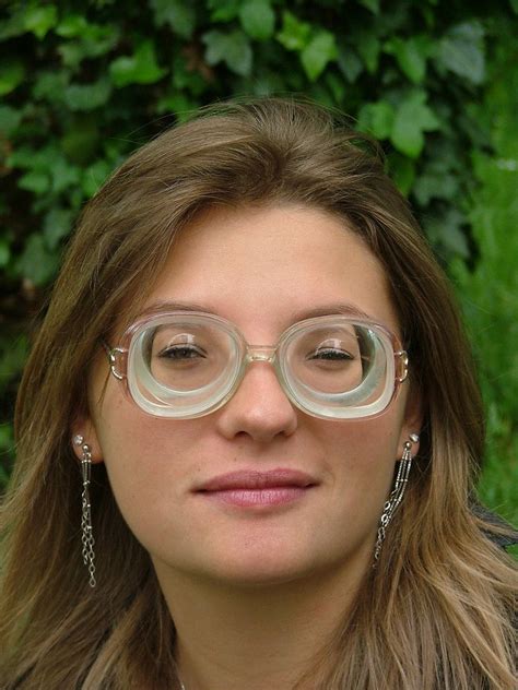 gael wearing strong thick glasses with big dangling earrings glasses geek glasses vintage