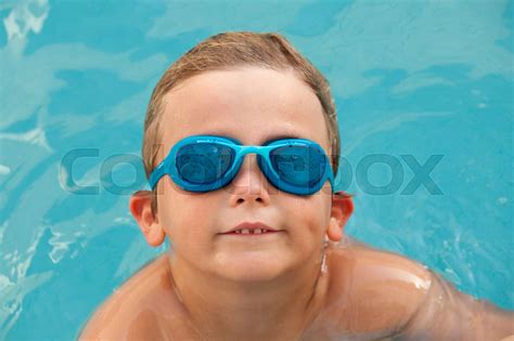 Funny Kid Cooling Off In The Pool Stock Image Colourbox
