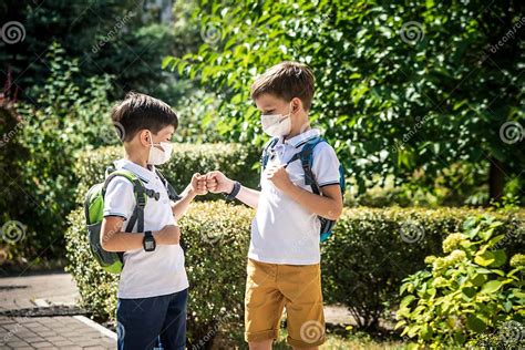 Children Greeting Kids Wearing Mask And Backpacks Protect And Safety