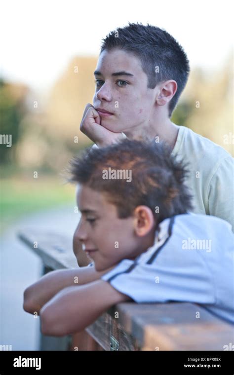 Teenage Boys Looking Bored Stock Photo Alamy