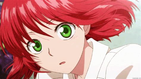 An Anime Character With Red Hair And Green Eyes