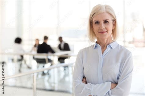 Confident Mature Businesswoman Looking At Camera Middle Aged Company