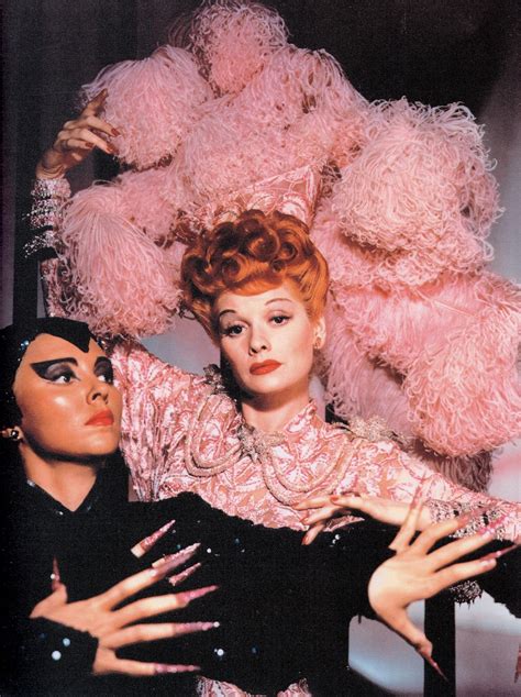 Lucille Ball In Flaming Red Hair And Outrageous Pink Feathered Headdress