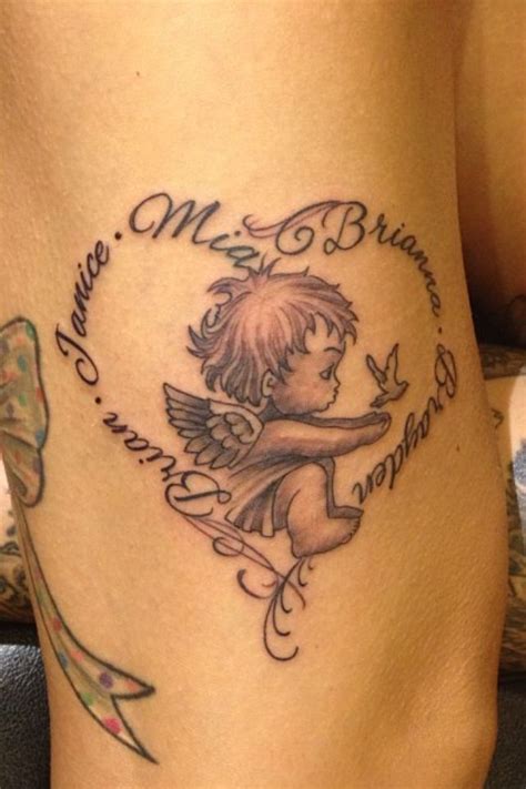 Dakota Ink Tattoo By Vaughn Baby Angel Tattoo Angel Tattoo Designs