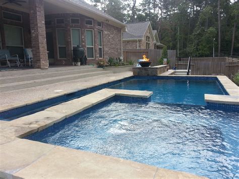 Fire bowls are a great addition for the perimeter of your pool. Fire Bowl | Fire features, Swimming pools, Fire bowls