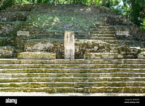 Ancient Mayan Ruins And Temples In The Archeological Site Of Lamanai