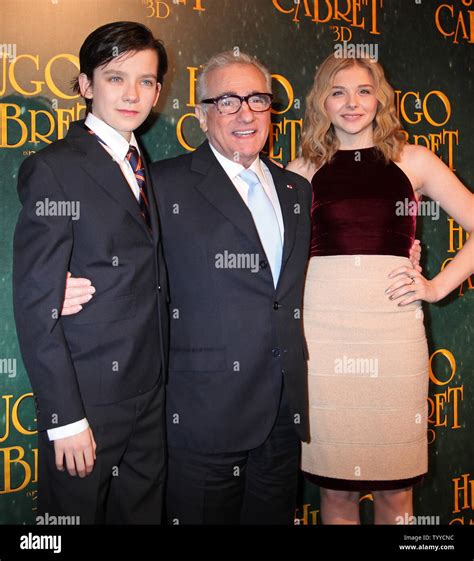 Asa Butterfield L Martin Scorsese C And Chloe Grace Moretz Arrive For The French Premiere