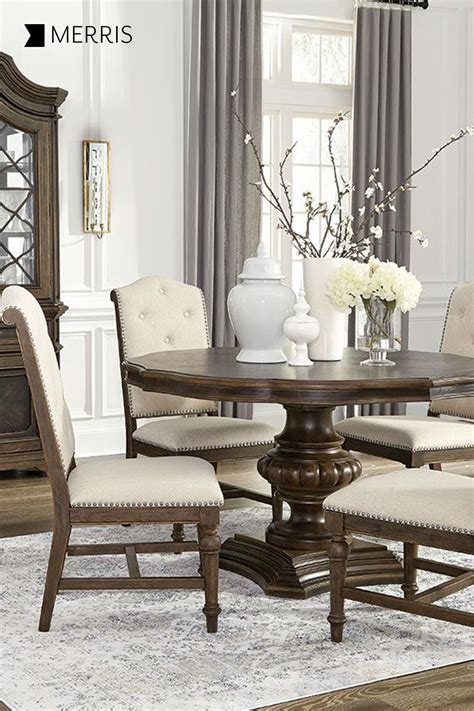 This collection is crafted with mindi tops and mahogany bases. The Merris Dining Collection puts a fashion-forward spin ...