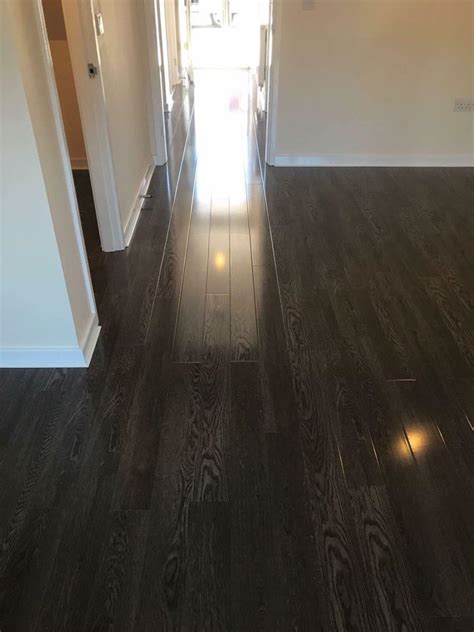 ðŸ˜How amazing does this beautiful dark grey high gloss laminate flooring
