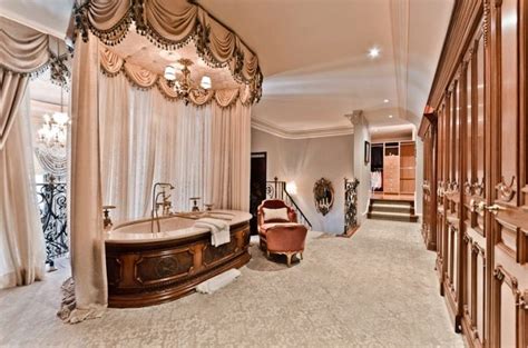 Traditional master bathroom with raised panel & limestone. Luxurious Master Bathrooms - Business Insider