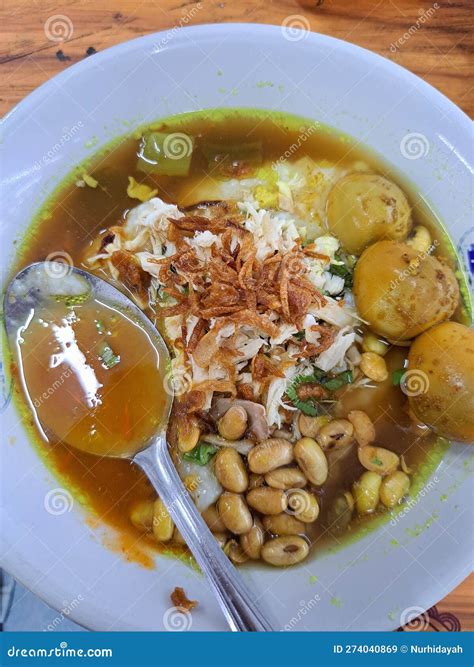 Chicken Porridge with Typical Indonesian Bandung Curry Sauce Stock