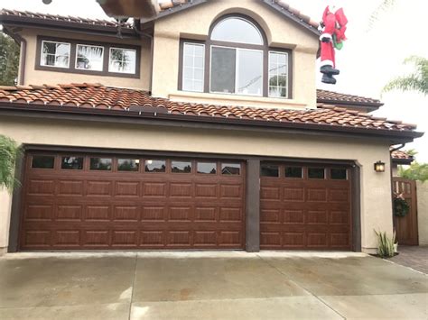 I was literally standing on a ladder in the center of my garage, watching my garage door go up and down as if controlled by an alien force. 58 | Up & Down Garage Doors