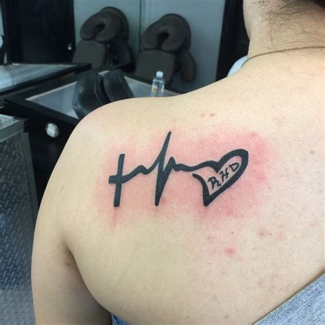 30 Heartbeat Tattoo Designs And Meanings Feel Your Own Rhythm