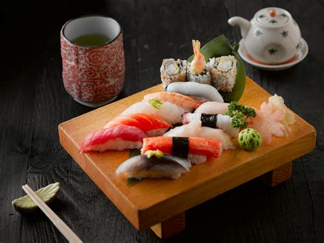 Sushi On Brown Wooden Board · Free Stock Photo