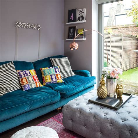 Lighting is an essential part of your living room, and you should have at least one source that's specifically brought in to be paired with your gray sofa. Grey living room with signature blue velvet slouch sofa | Living room grey, Scandi living room ...